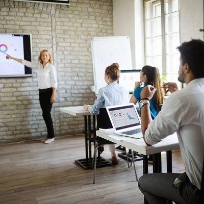 Business, technology and people concept - creative team or designers working on user interface at office