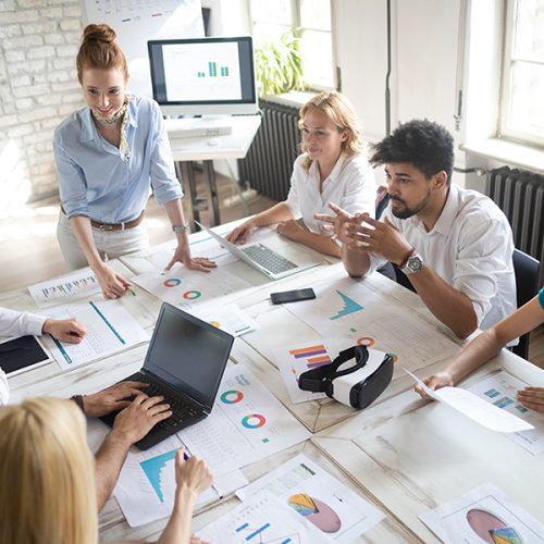 Business, technology and people concept – creative team or designers working in office Business, technology and people concept - creative team or designers working on user interface at office